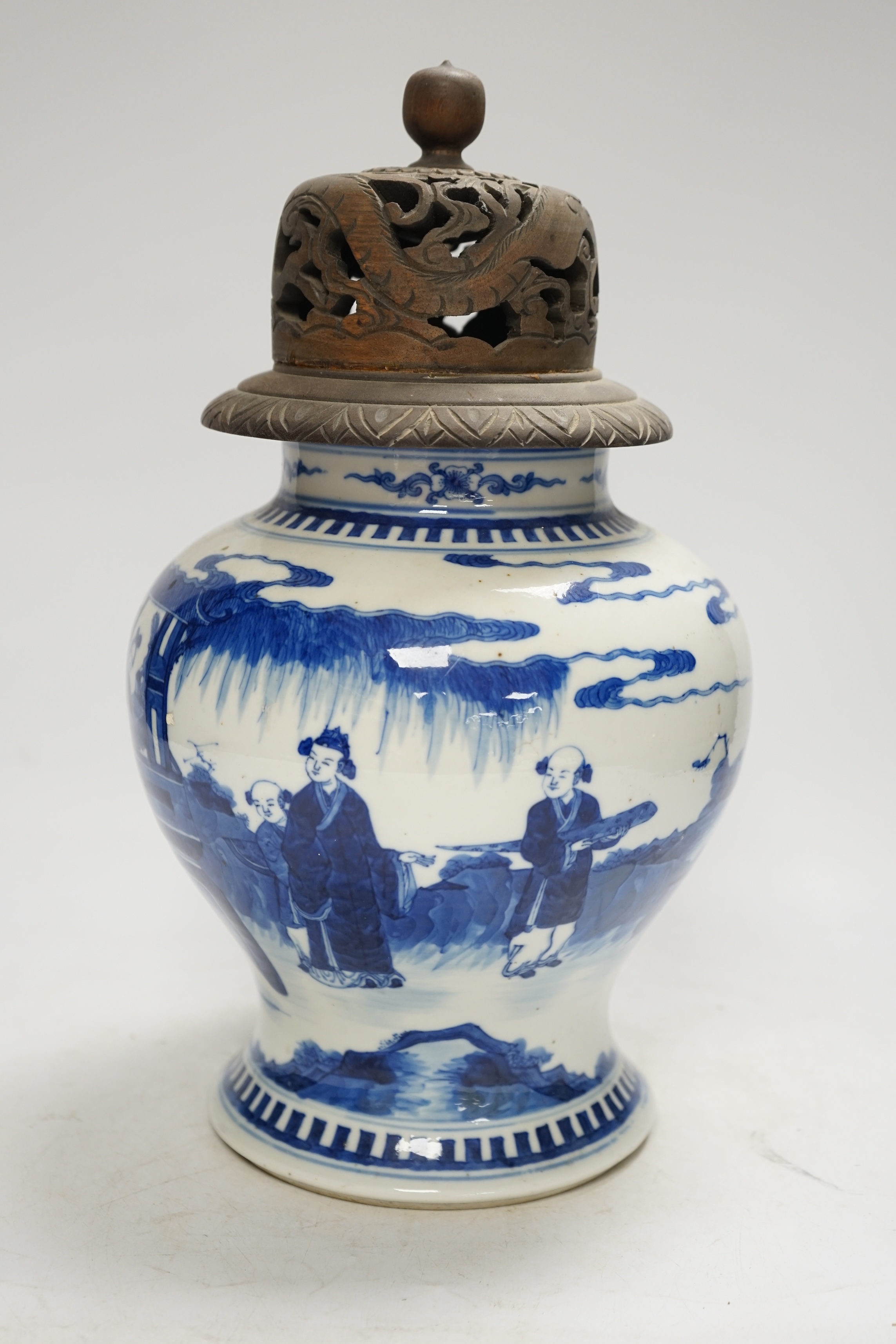 A 19th century Chinese blue and white baluster jar, painted with a scene from the Romance of the Western chamber, wood cover, 34cm. Condition - good